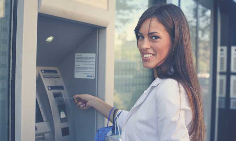 woman using a debit card