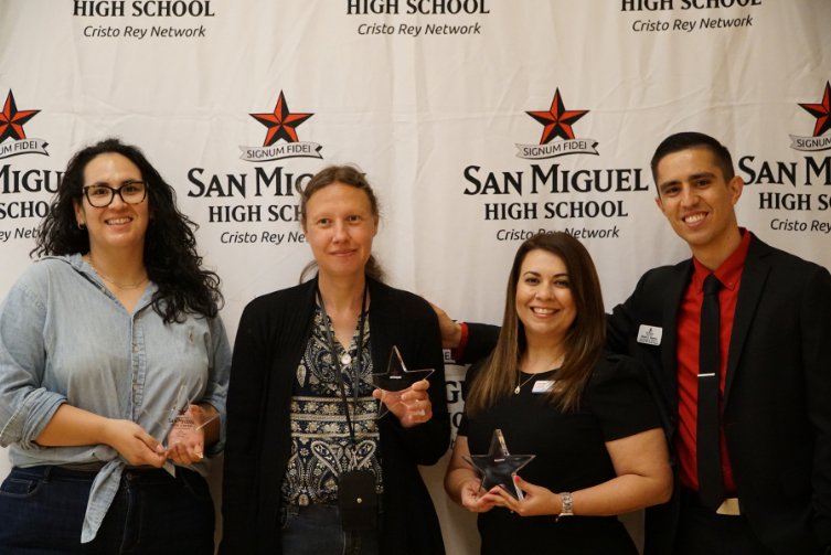 The San Miguel High School team pose with Hughes Membership and Community Engagement Manager, Irlanda Cuevas.