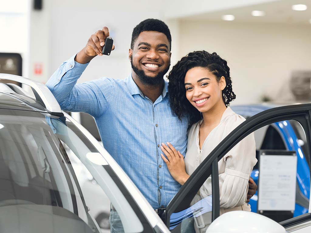 Couple purchasing new car
