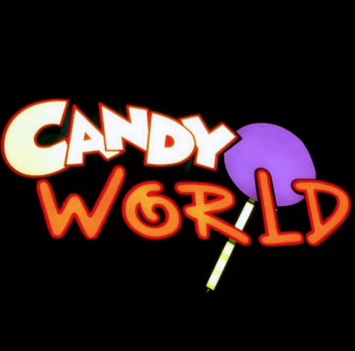 White and orange text in a black square with a purple lollipop